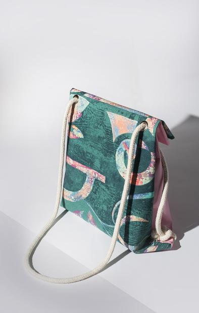 CONVERTIBLE GREEN & PINK BACKPACK